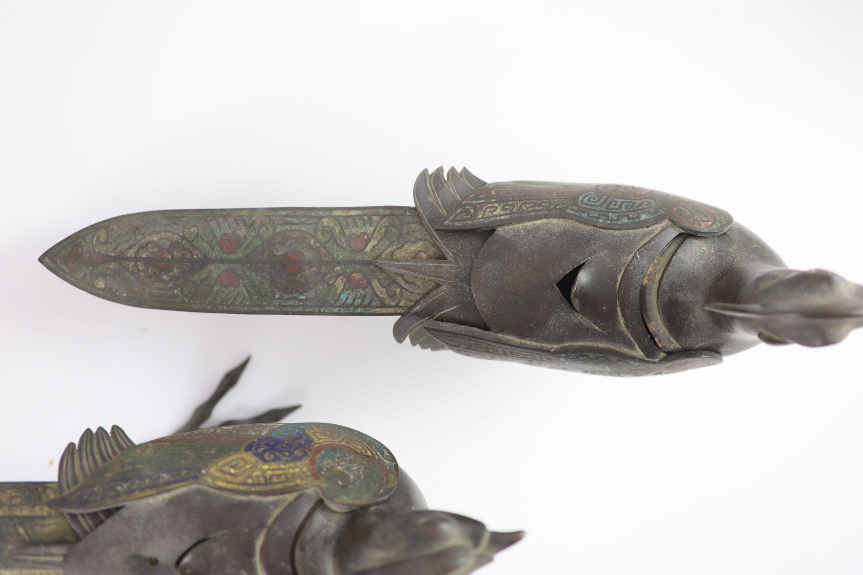 Two similar Japanese champlevé enamel and bronze ‘pheasant’ censers and covers, Meiji period, 39 cm long